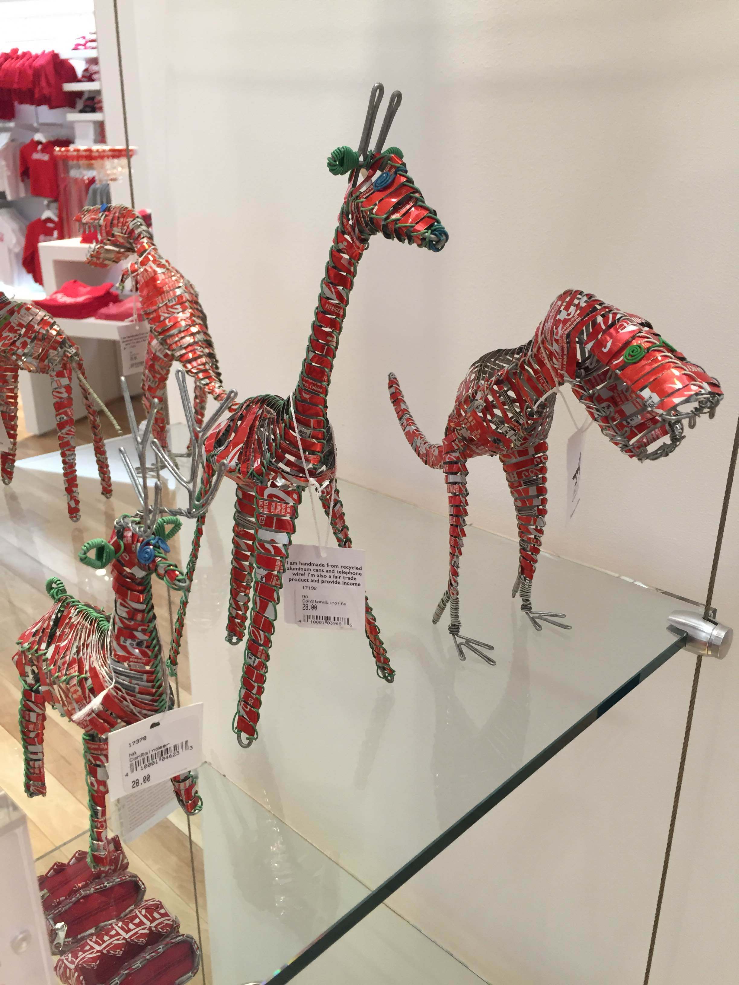 Products for sale in the Coca-Cola store that were made by artisans who are being trained on how to design and produce handcrafted items from recycled beverage containers