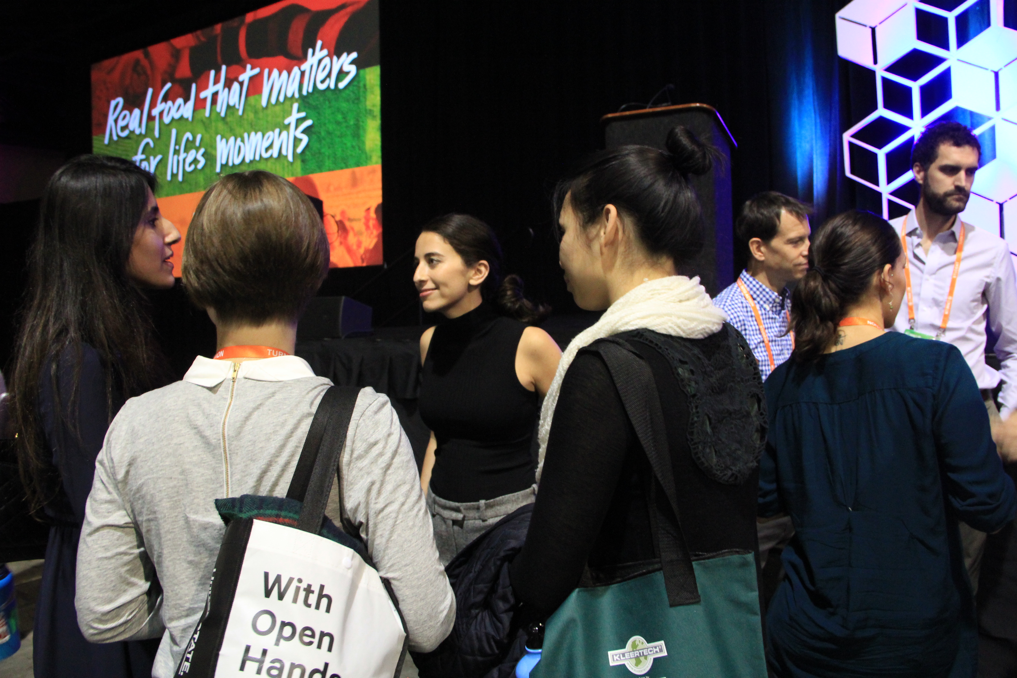 Attendees networking with Sustain Natural Co-Founder and Marketing Director, Meika Hollender after her keynote speech.